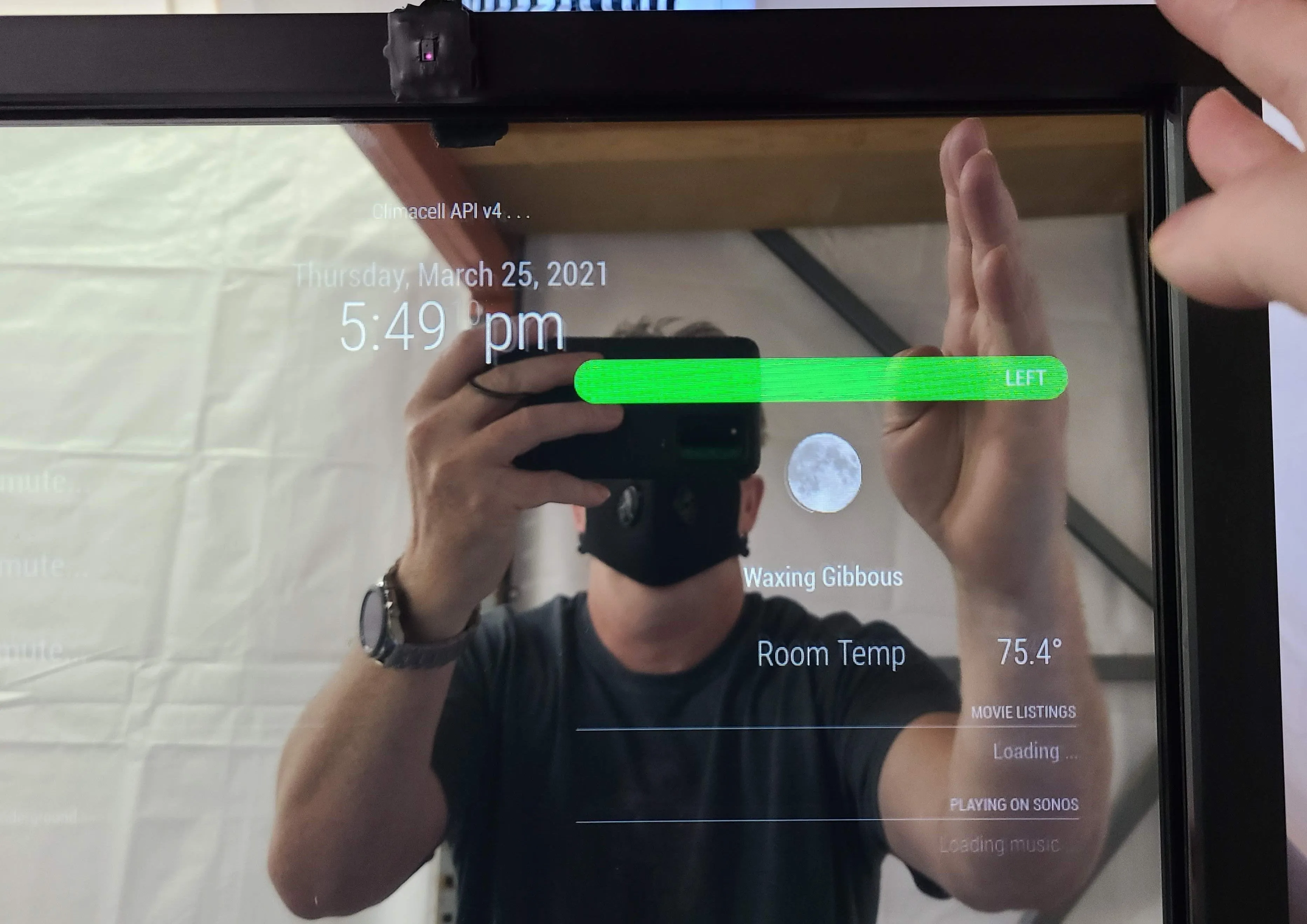 Framed Google Assistant Smart Mirror - 65" Samsung 4K QLED in a sleek 60" X 36" X 3" Satin Black Wood Frame